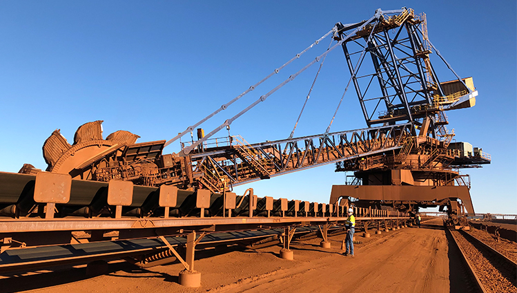 Iron ore falls more than 4.5%, trades below $100