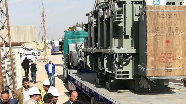The arrival of three electricity transformers to rehabilitate the Iron and Steel Company in Basra
